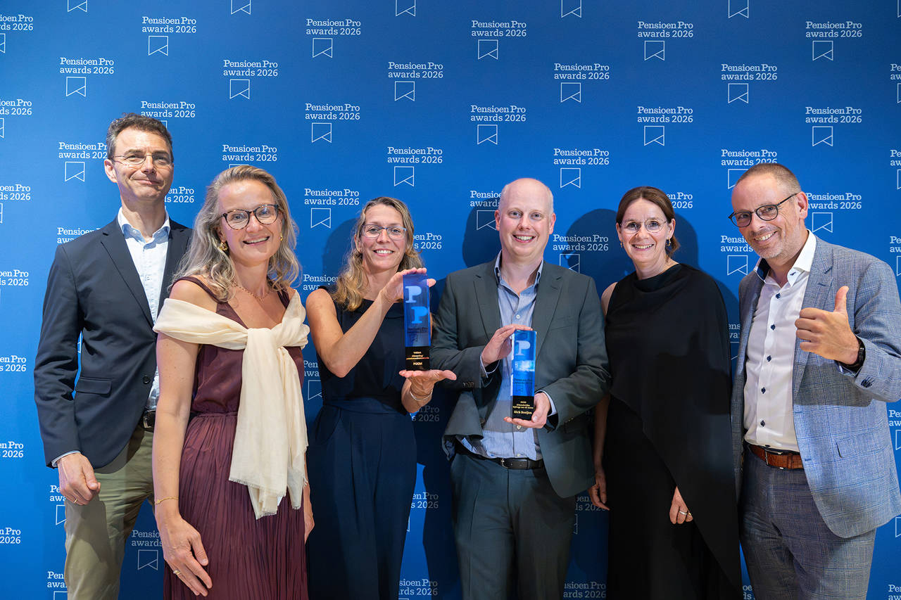 Groepsfoto met beide awards
